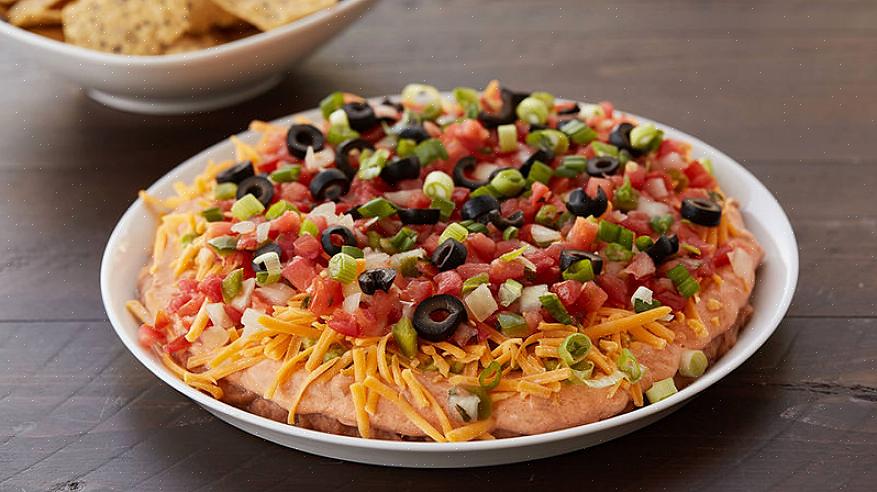 Sinäkin voit tehdä oman version Seven Layer Taco Dip -pelistä