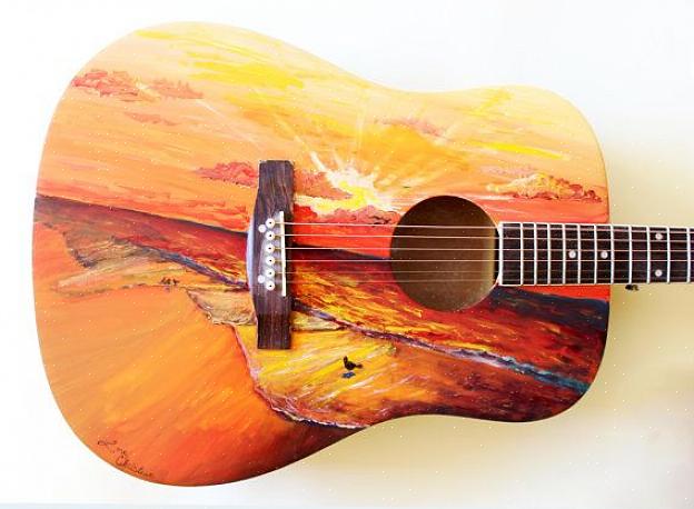 Miten voit lisätä mukautetun maalauksen akustiseen kitarallesi